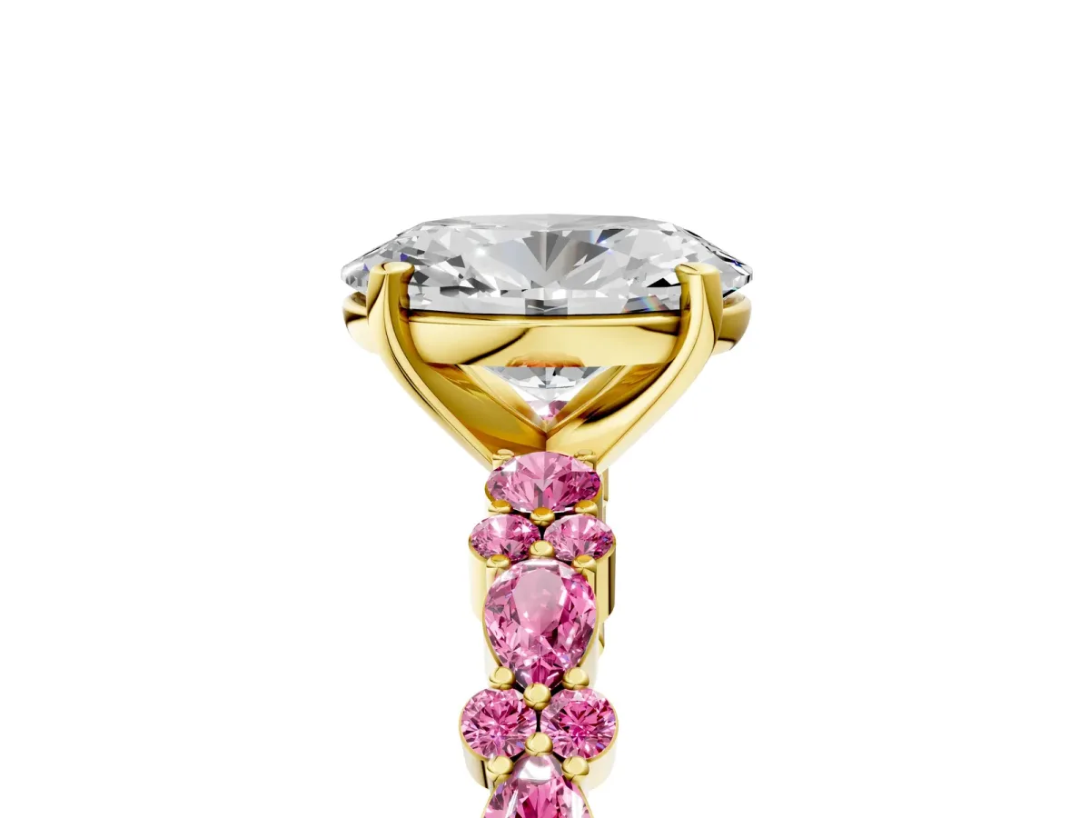 Oval Cut Diamond Side Stone Solitaire Ring with Round Pink Sapphire and Four-Prong Setting Yellow gold