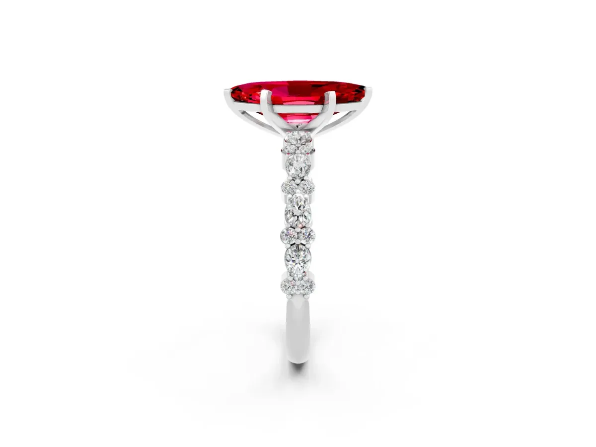 Marquise Cut Ruby Side Stone Solitaire Ring with Round and Four-Prong Setting Platinum