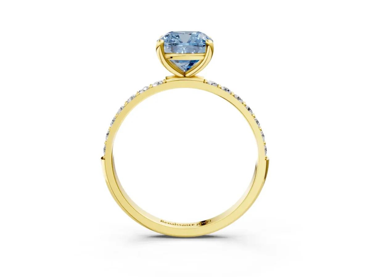 Fancy Blue Cushion Cut Diamond Solitaire Ring with Round Pavé Band and Prong Setting Yellow gold