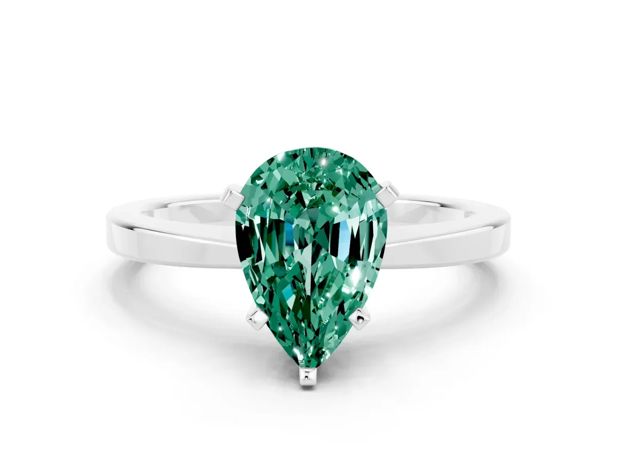 Pear Cut Green Sapphire Solitaire Engagement Ring with Classic Band and Four-Prong Setting Silver