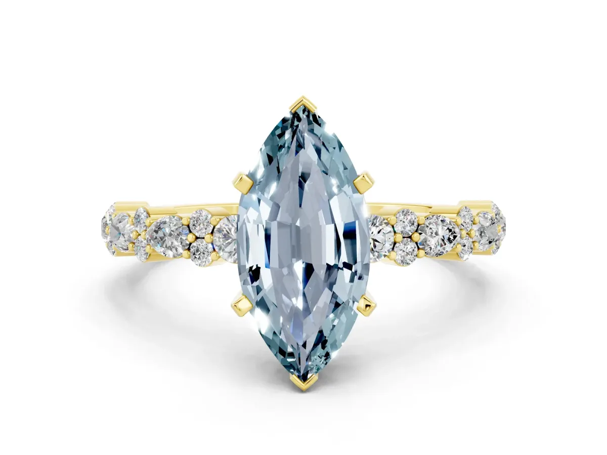 Marquise Cut Aquamarine Side Stone Solitaire Ring with Round and Four-Prong Setting Yellow gold