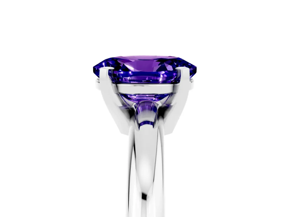 Oval Cut Tanzanite Solitaire Engagement Ring with Round Band and Four-Prong Setting Platinum