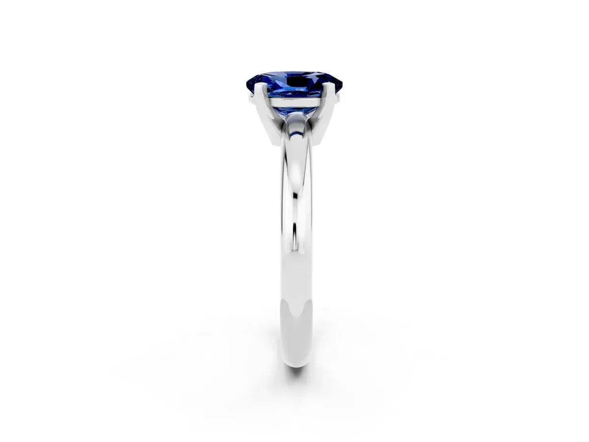Oval Cut Blue Sapphire Solitaire Engagement Ring with Round Band and Four-Prong Setting Silver
