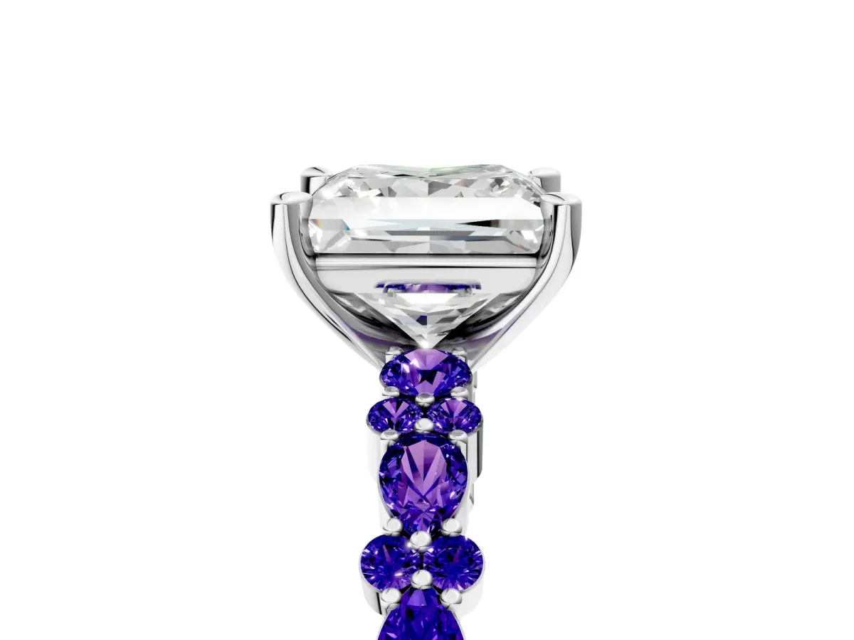 Princess Cut Diamond Side Stone Solitaire Ring with Round Tanzanite and Four-Prong Setting Platinum