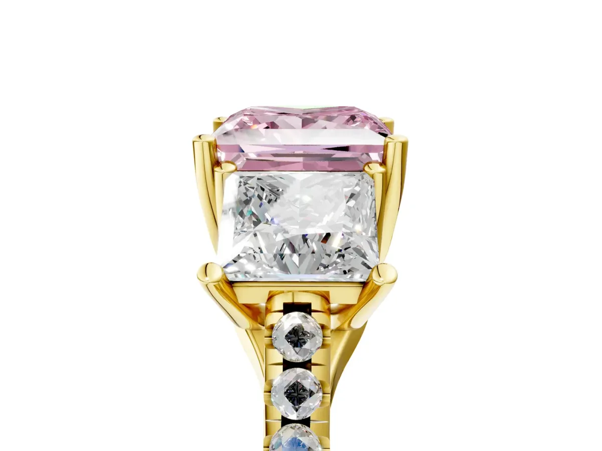 Fancy Pink Three-Stone Princess Cut Diamond Ring with Round Pavé Band and Prong Setting Yellow gold