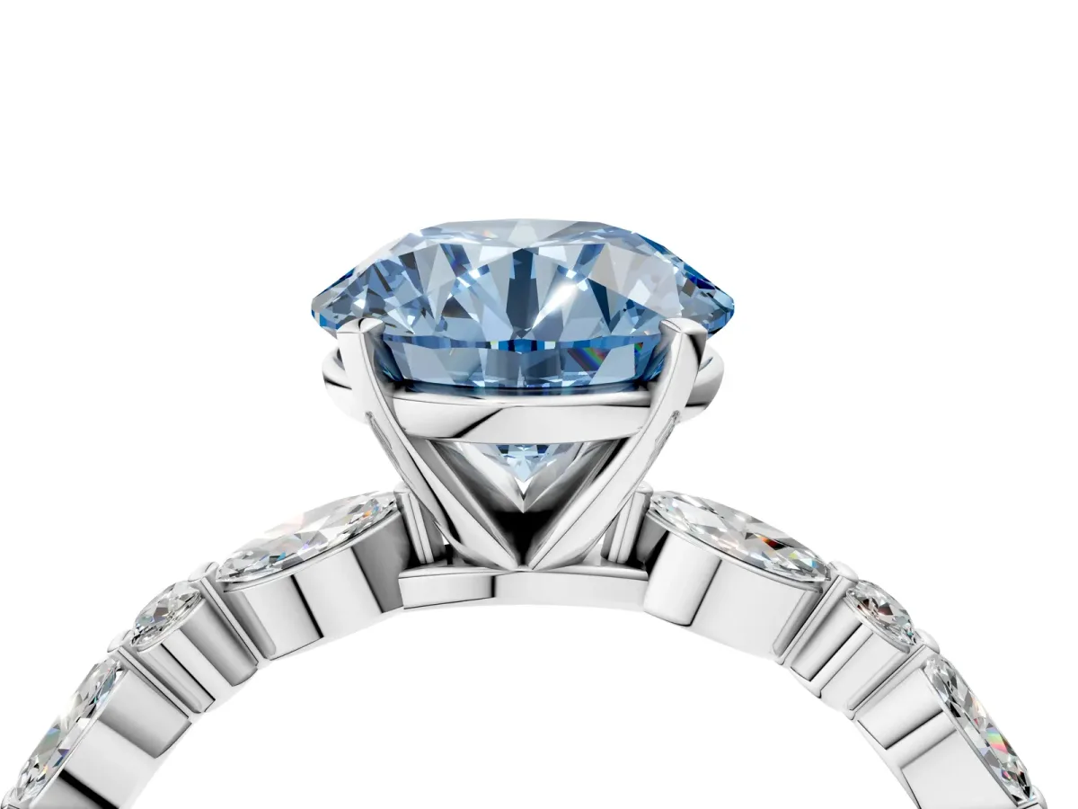 Fancy Blue Round Cut Diamond Ring with Marquise and Round Side Stones and Four-Prong Setting White gold
