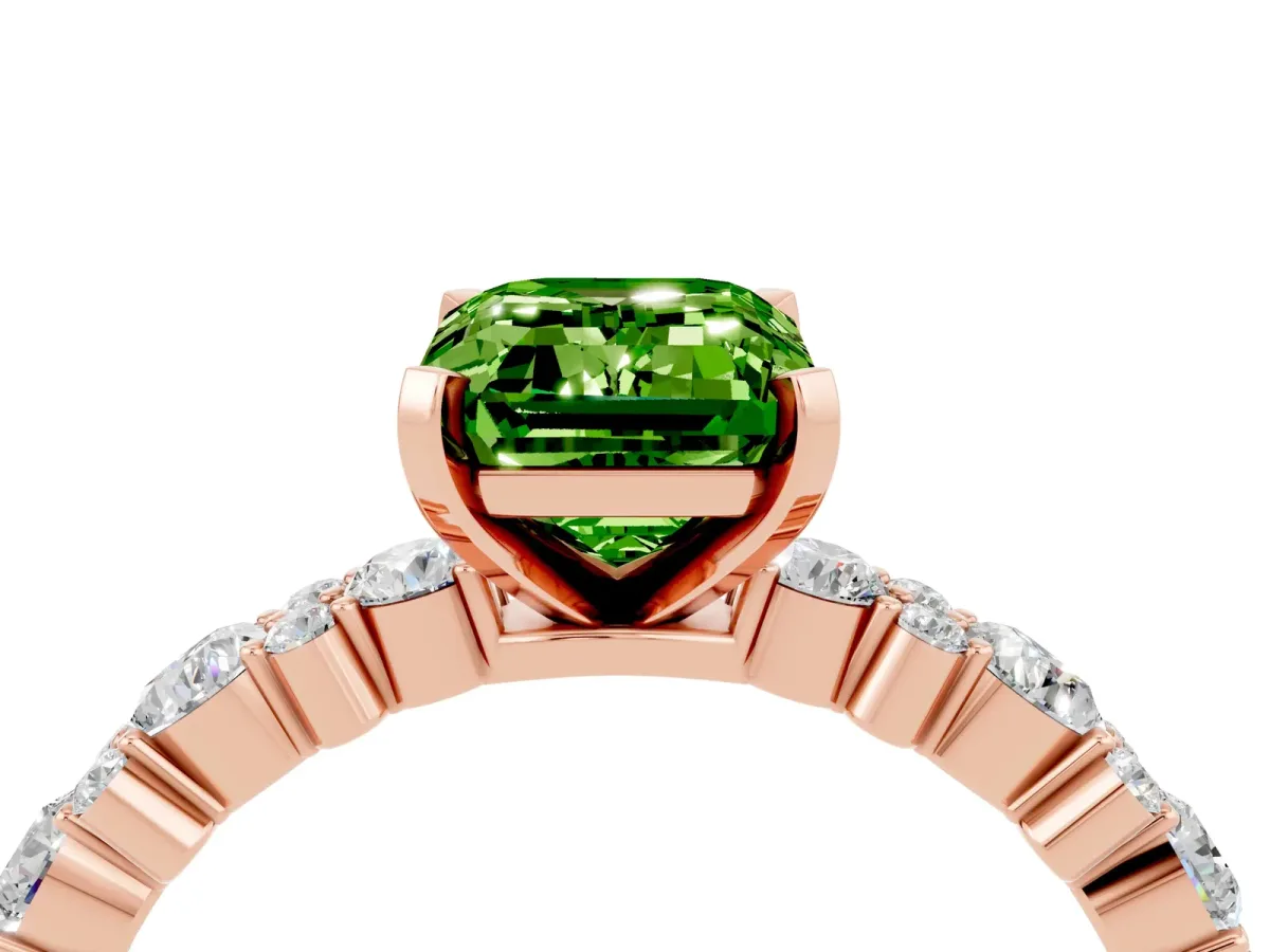 Emerald Cut Peridot Side Stone Solitaire Ring with Round and Four-Prong Setting Rose gold