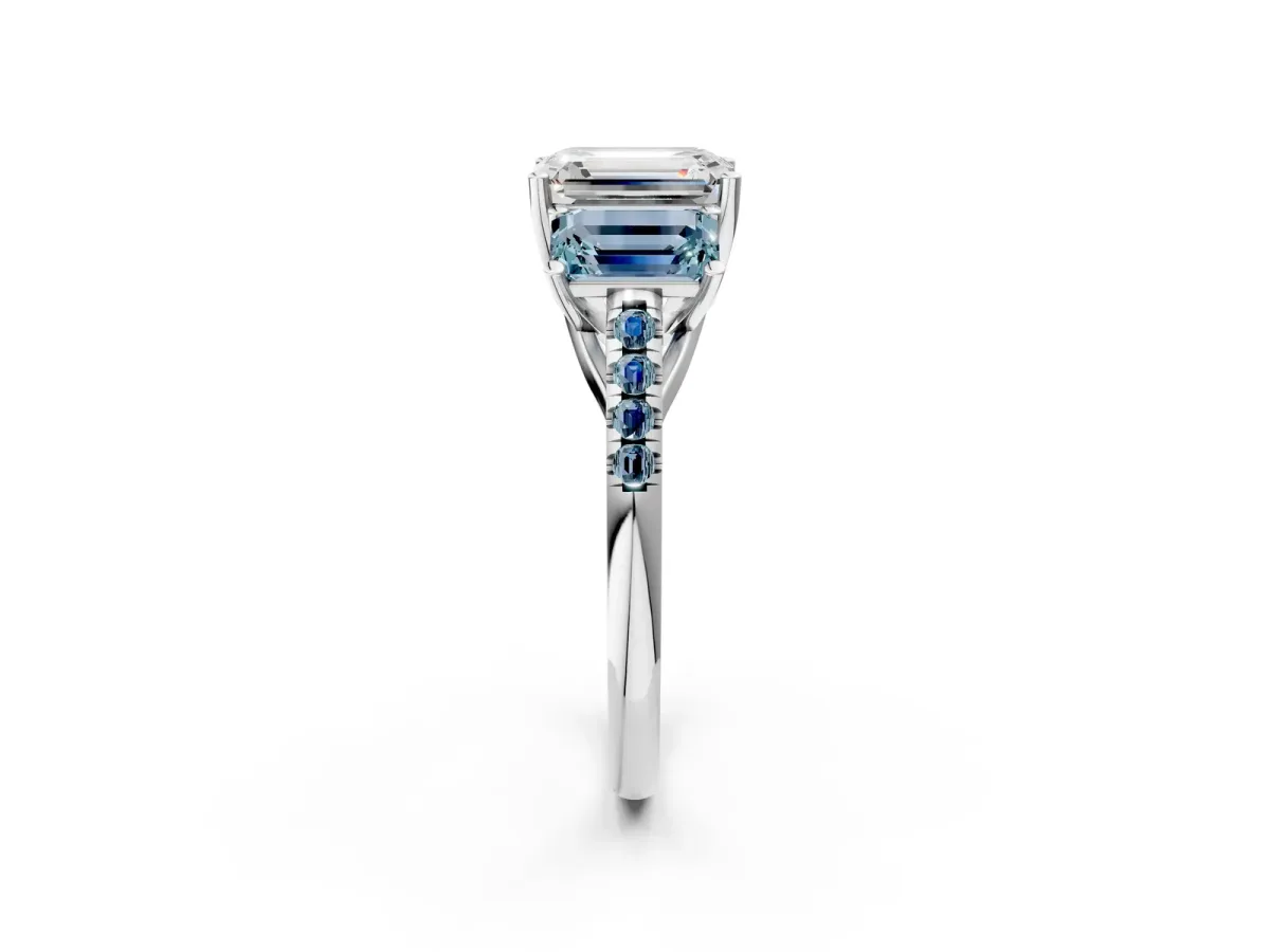 Three-Stone Emerald Cut Diamond Ring with Round Aquamarine Pavé Band and Prong Setting Platinum