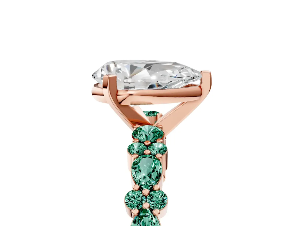 Pear Cut Diamond Side Stone Solitaire Ring with Round Green Sapphire and Four-Prong Setting Rose gold