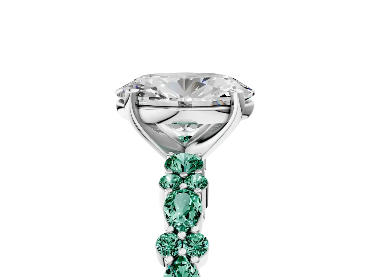 Oval Cut Diamond Side Stone Solitaire Ring with Round Green Sapphire and Four-Prong Setting White gold