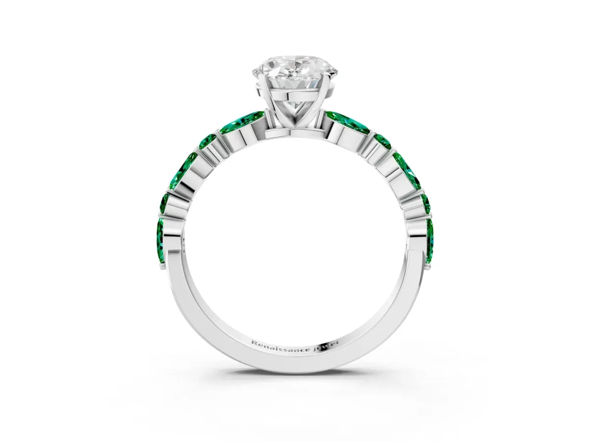 Oval Cut Diamond Ring with Marquise and Round Emerald Side Stones and Four-Prong Setting White gold