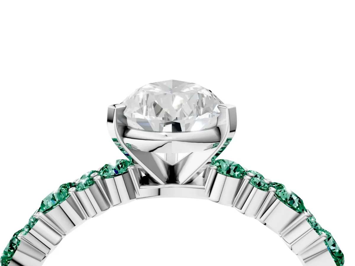 Pear Cut Diamond Side Stone Solitaire Ring with Round Green Sapphire and Four-Prong Setting Platinum