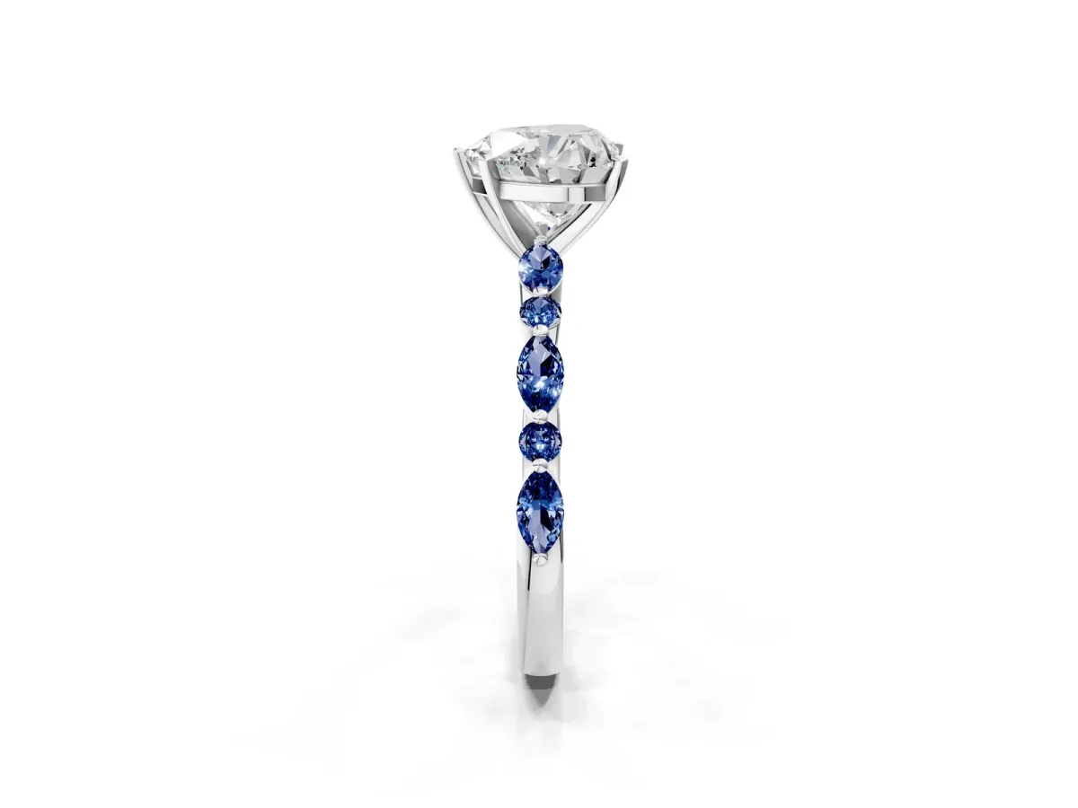 Heart Cut Diamond Ring with Marquise and Round Blue Sapphire Side Stones and Four-Prong Setting Silver
