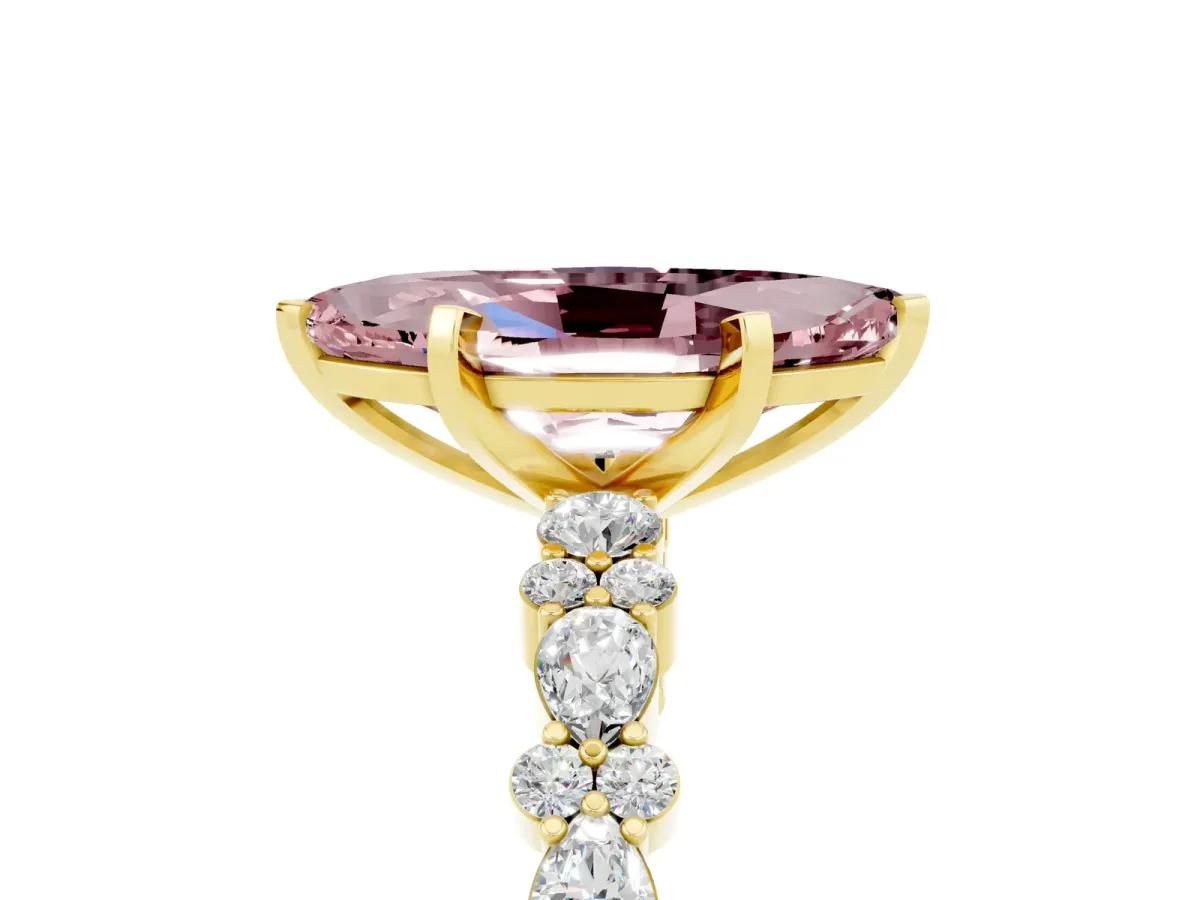 Marquise Cut Morganite Side Stone Solitaire Ring with Round and Four-Prong Setting Yellow gold