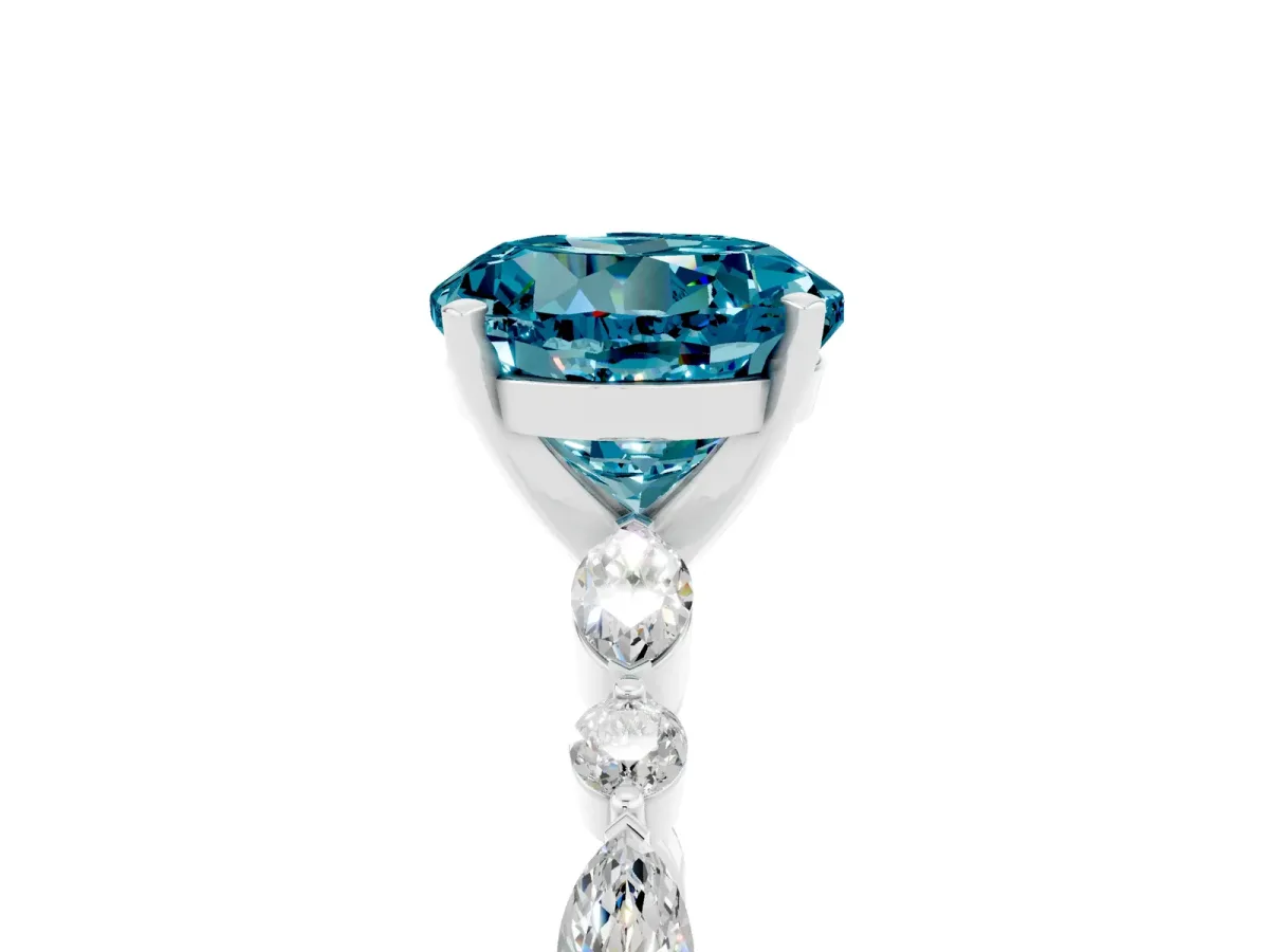 Round Cut Blue Topaz Ring with Marquise and Round Side Stones and Four-Prong Setting Silver