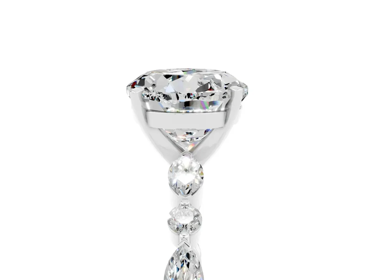 Round Cut Moissanite Ring with Marquise and Round Side Stones and Four-Prong Setting Silver