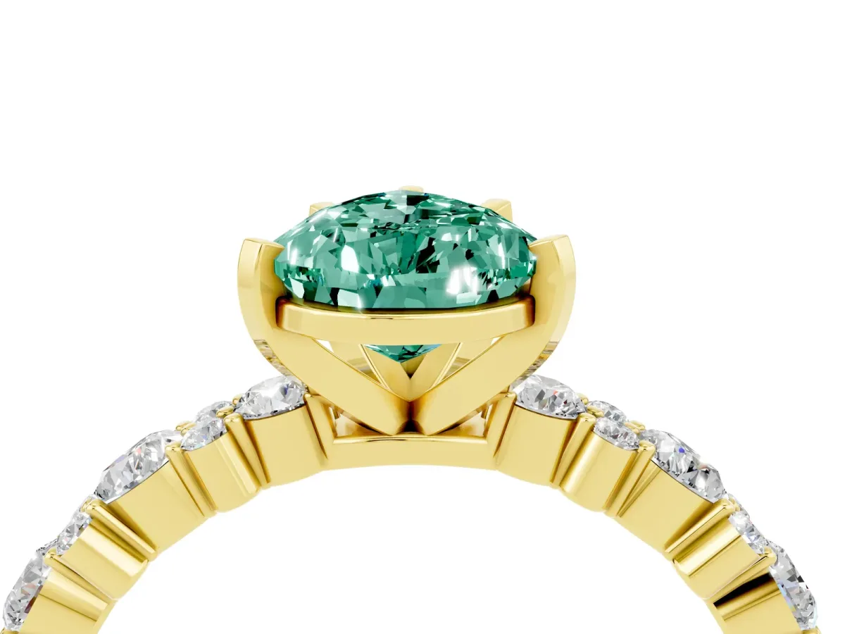 Pear Cut Green Sapphire Side Stone Solitaire Ring with Round and Four-Prong Setting Yellow gold