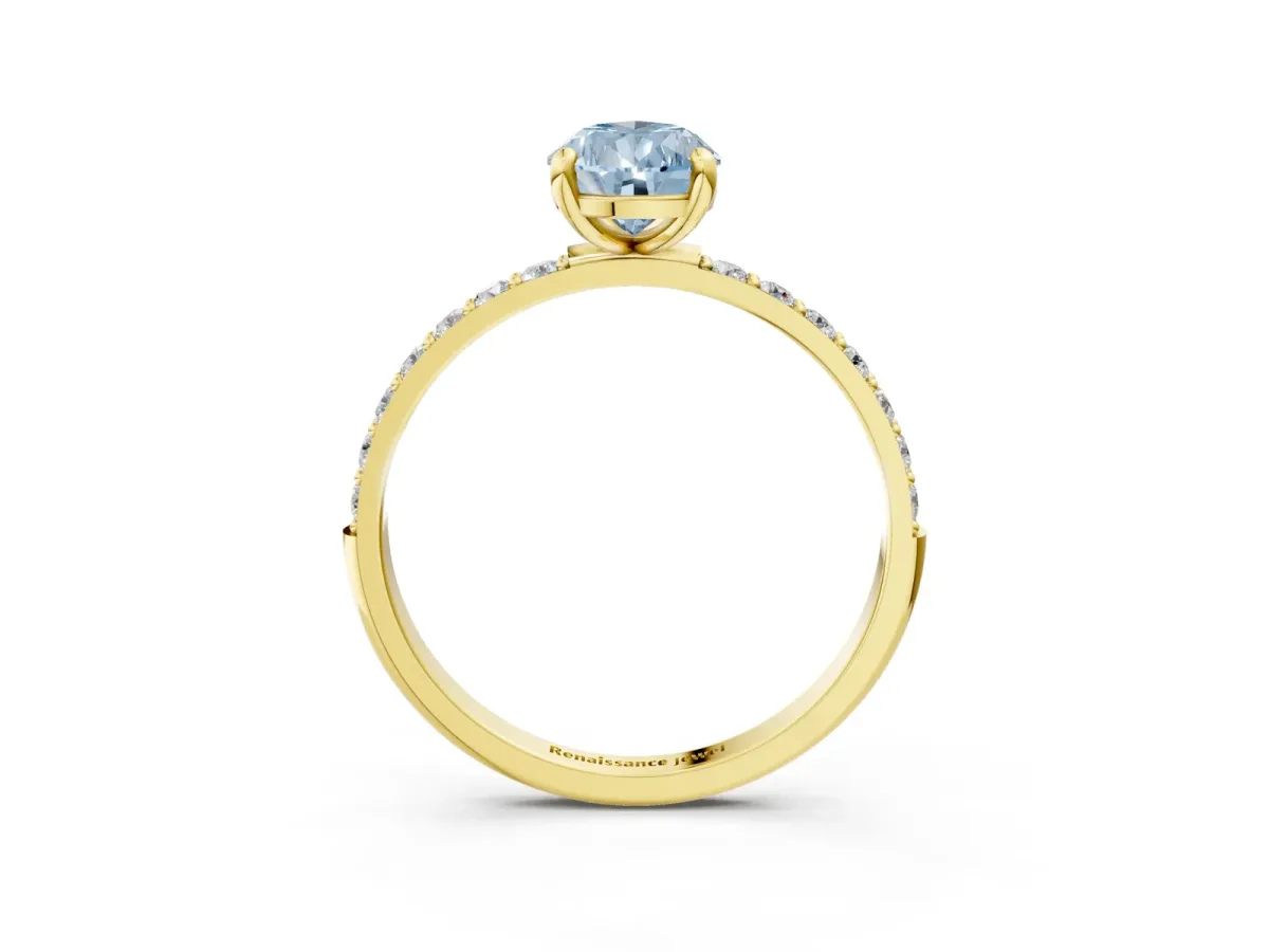 Fancy Blue Pear Cut Diamond Solitaire Ring with Round Pavé Band and Prong Setting Yellow gold