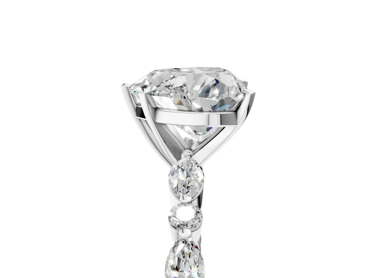 Heart Cut Diamond Ring with Marquise and Round Side Stones and Four-Prong Setting Platinum