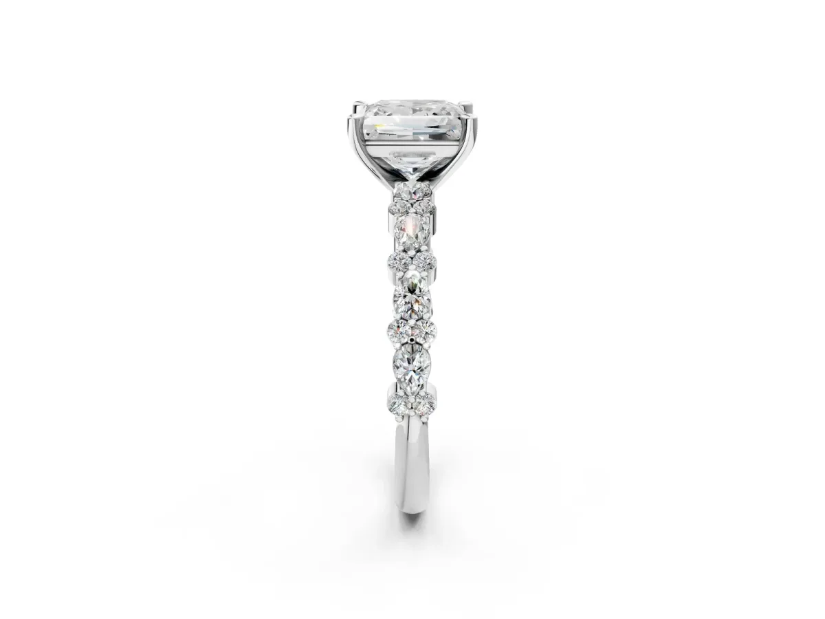 Princess Cut Diamond Side Stone Solitaire Ring with Round and Four-Prong Setting Platinum
