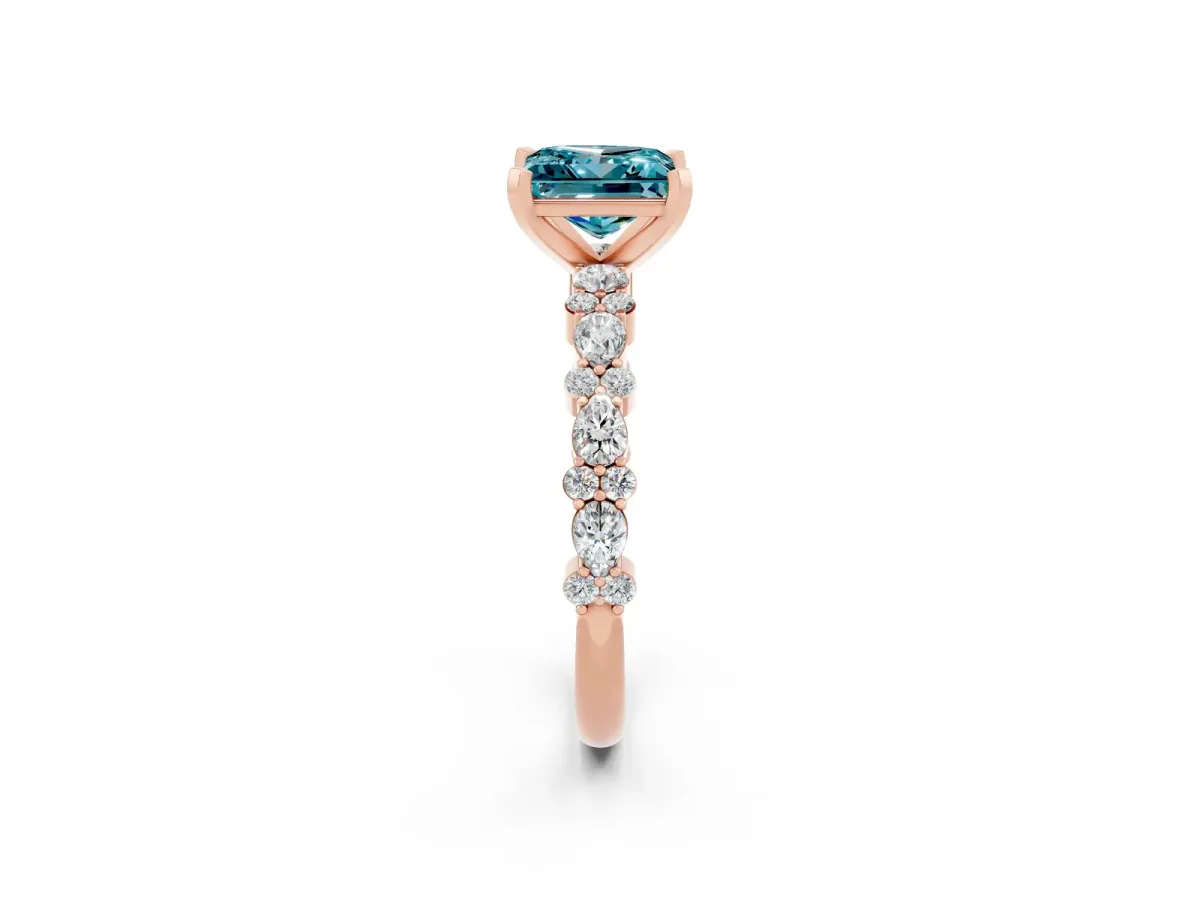 Princess Cut Blue Topaz Side Stone Solitaire Ring with Round and Four-Prong Setting Rose gold