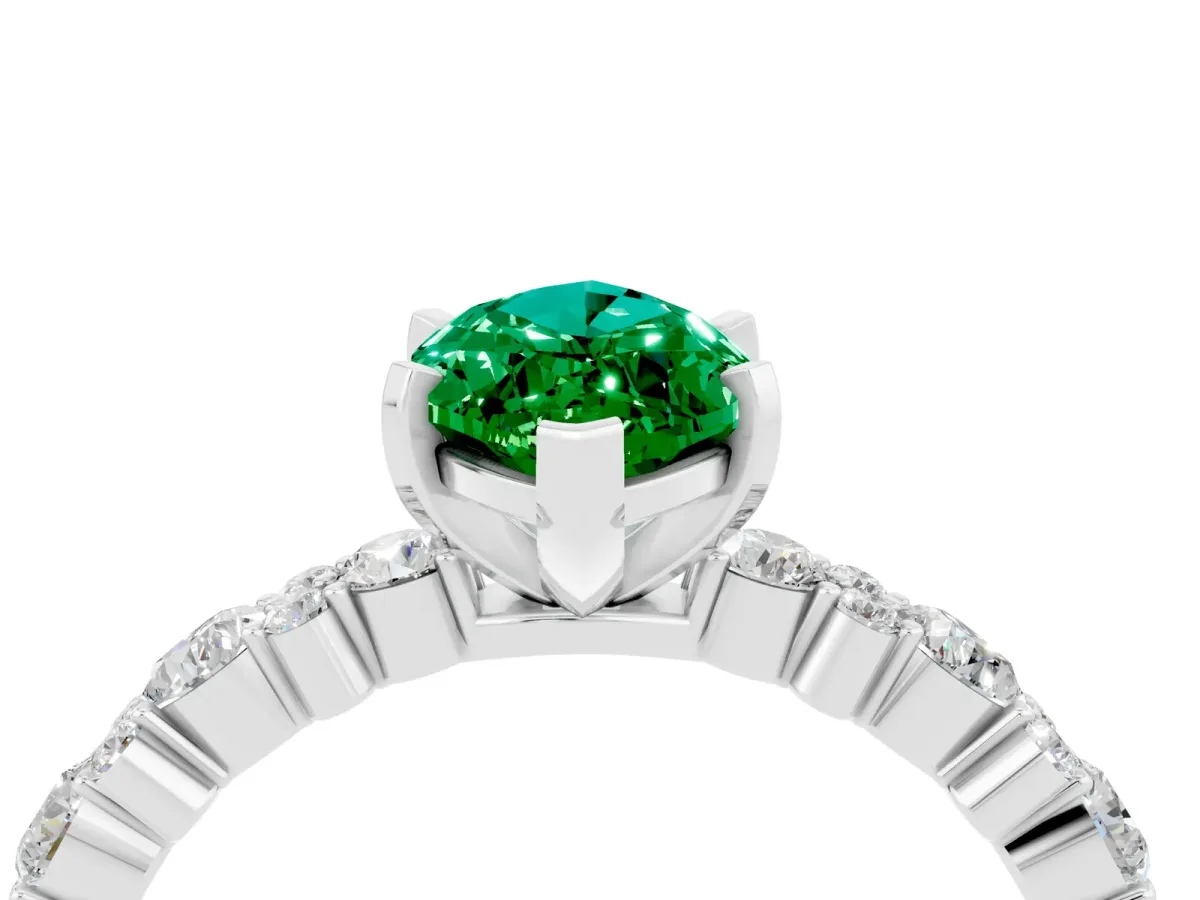 Marquise Cut Emerald Side Stone Solitaire Ring with Round and Four-Prong Setting White gold