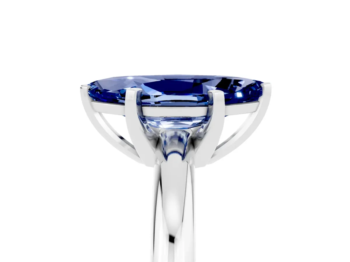 Marquise Cut Blue Sapphire Solitaire Engagement Ring with Round Band and Four-Prong Setting Silver