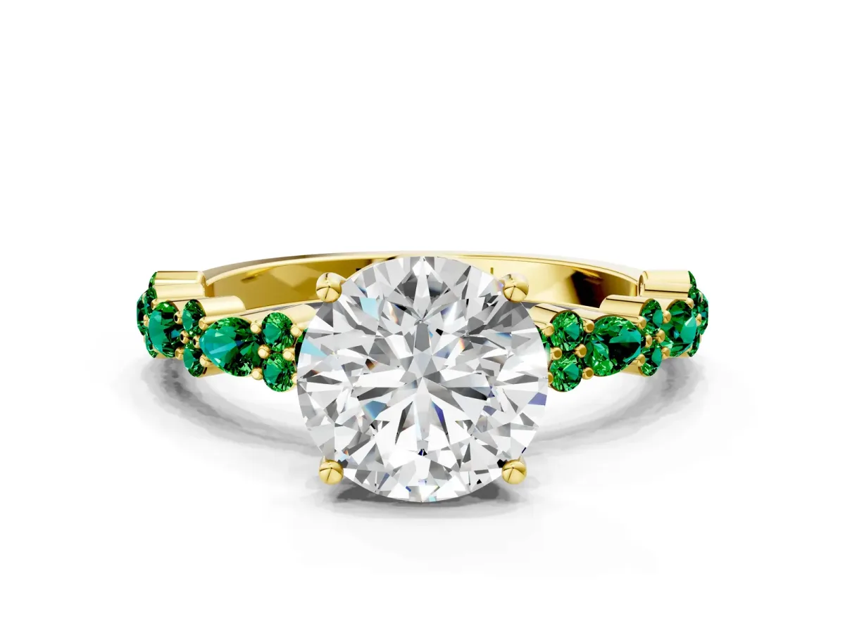 Round Cut Diamond Side Stone Solitaire Ring with Round Emerald and Four-Prong Setting Yellow gold