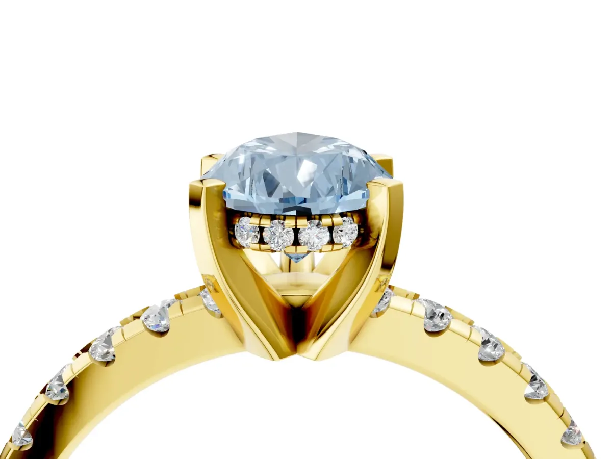 Fancy Blue Pear Cut Diamond Solitaire Ring with Round Pavé Band and Four-Prong Setting Yellow gold