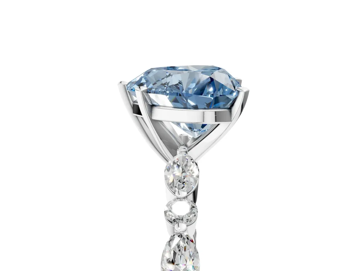 Fancy Blue Heart Cut Diamond Ring with Marquise and Round Side Stones and Four-Prong Setting Silver