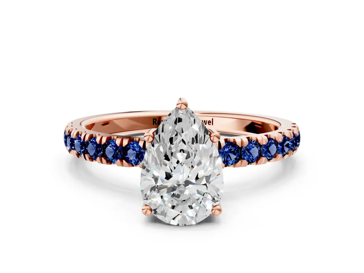 Pear Cut Diamond Pave Band Solitaire Ring with Round Blue Sapphire and Prong Setting Rose gold