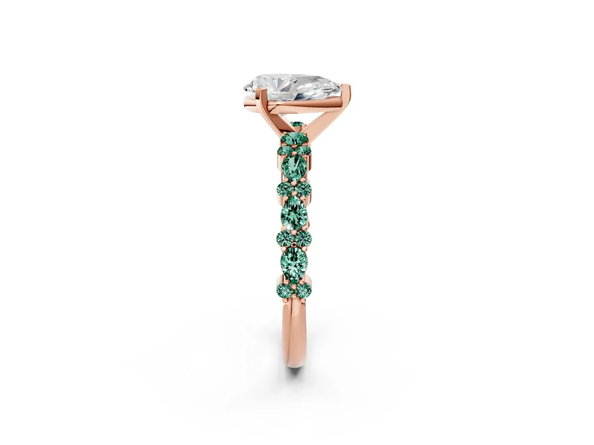 Pear Cut Diamond Side Stone Solitaire Ring with Round Green Sapphire and Four-Prong Setting Rose gold