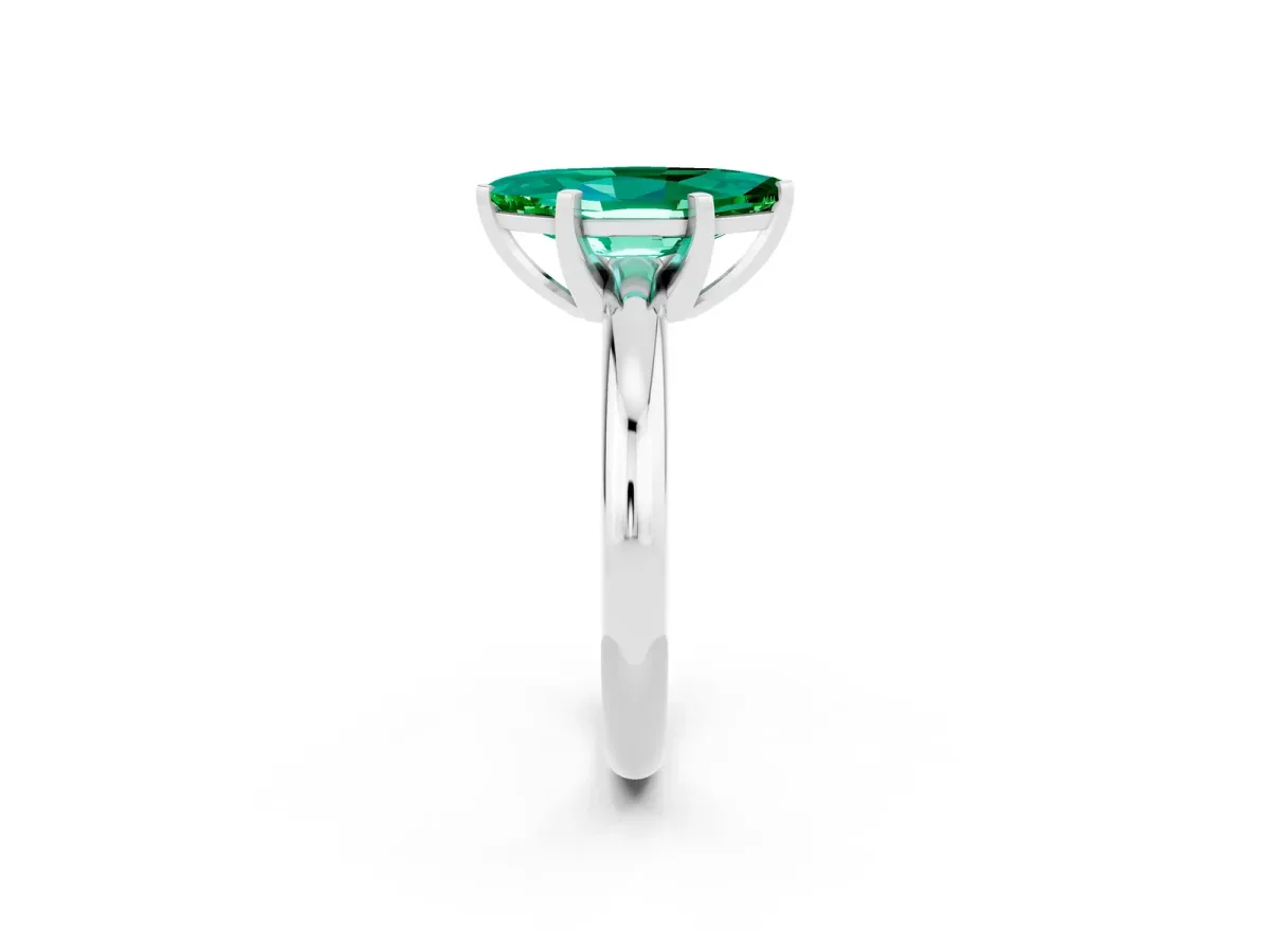 Marquise Cut Emerald Solitaire Engagement Ring with Round Band and Four-Prong Setting Silver
