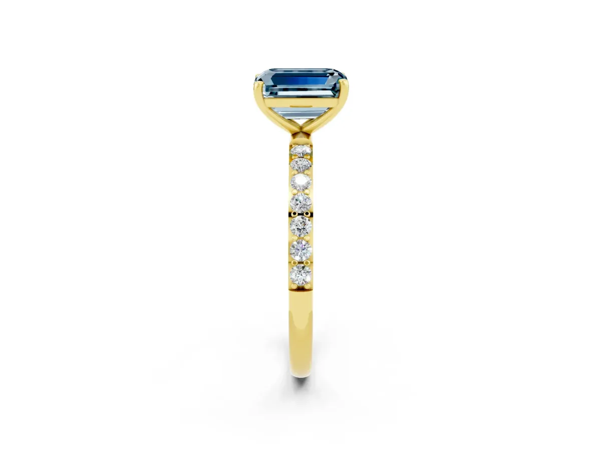 Emerald Cut Aquamarine Solitaire Ring with Round Pavé Band and Prong Setting Yellow gold