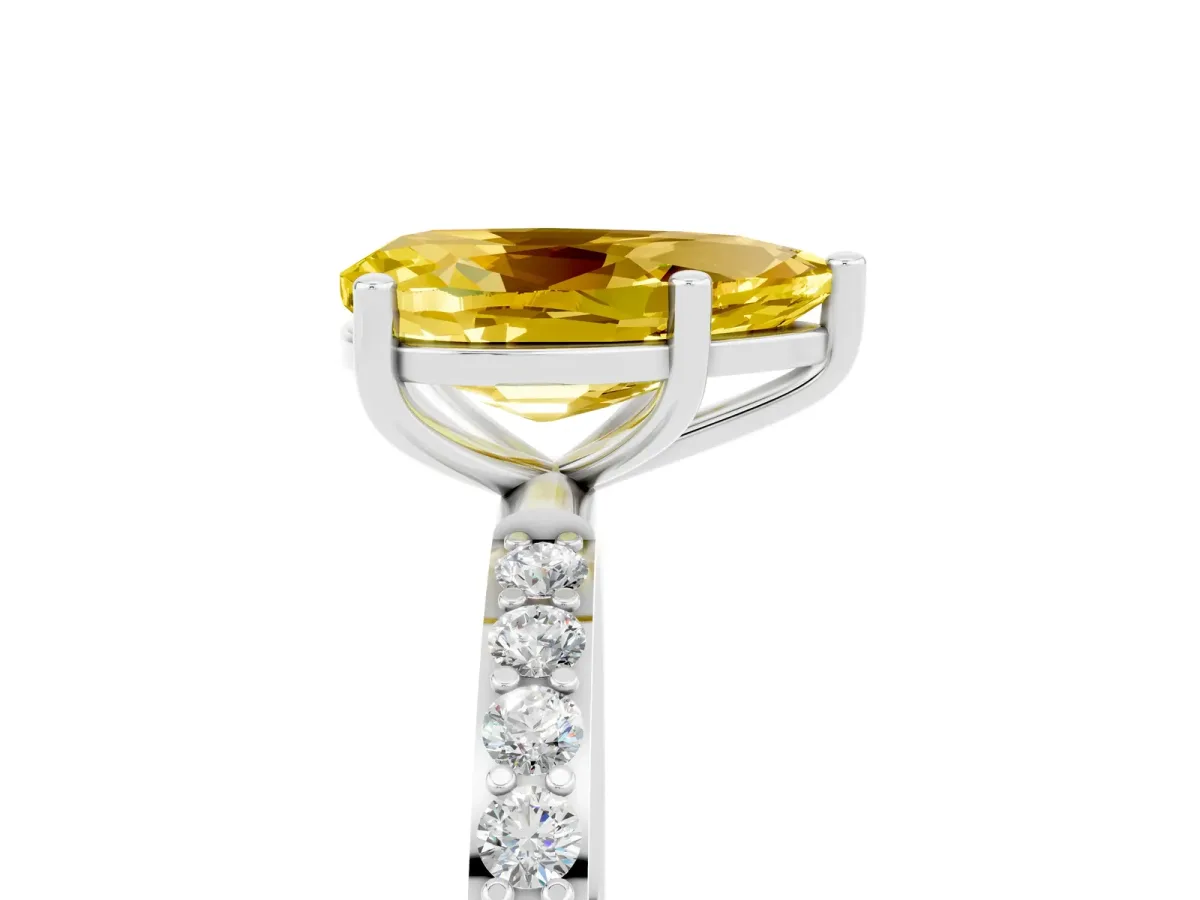Pear Cut Yellow Sapphire Solitaire Ring with Round Pavé Band and Prong Setting Silver