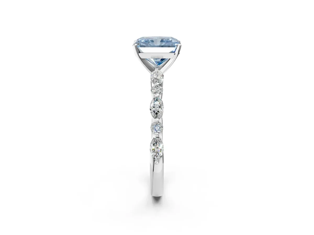 Fancy Blue Radiant Cut Diamond Ring with Marquise and Round Side Stones and Four-Prong Setting Silver