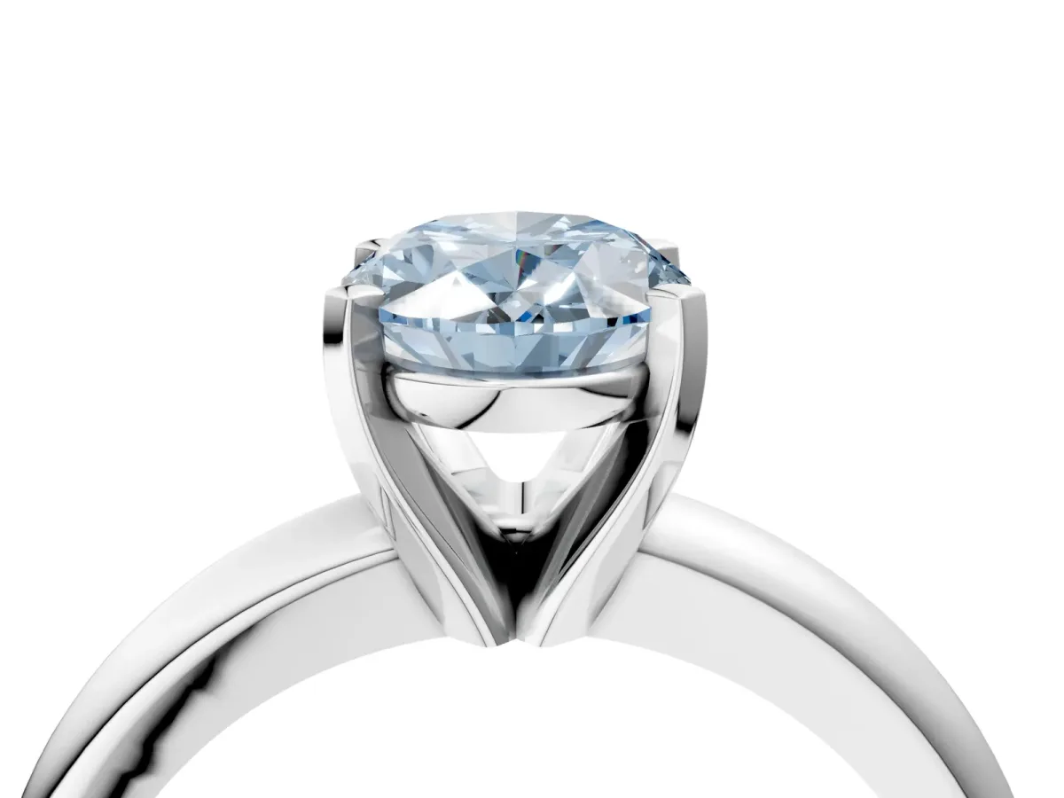 Fancy Blue Oval Cut Diamond Solitaire Engagement Ring with Round Band and Four-Prong Setting White gold