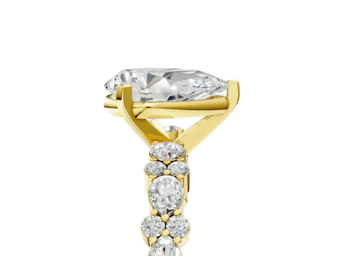 Pear Cut Diamond Side Stone Solitaire Ring with Round Moissanite and Four-Prong Setting Yellow gold