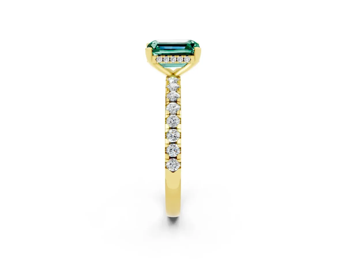 Emerald Cut Green Sapphire Solitaire Ring with Round Pavé Band and Four-Prong Setting Yellow gold