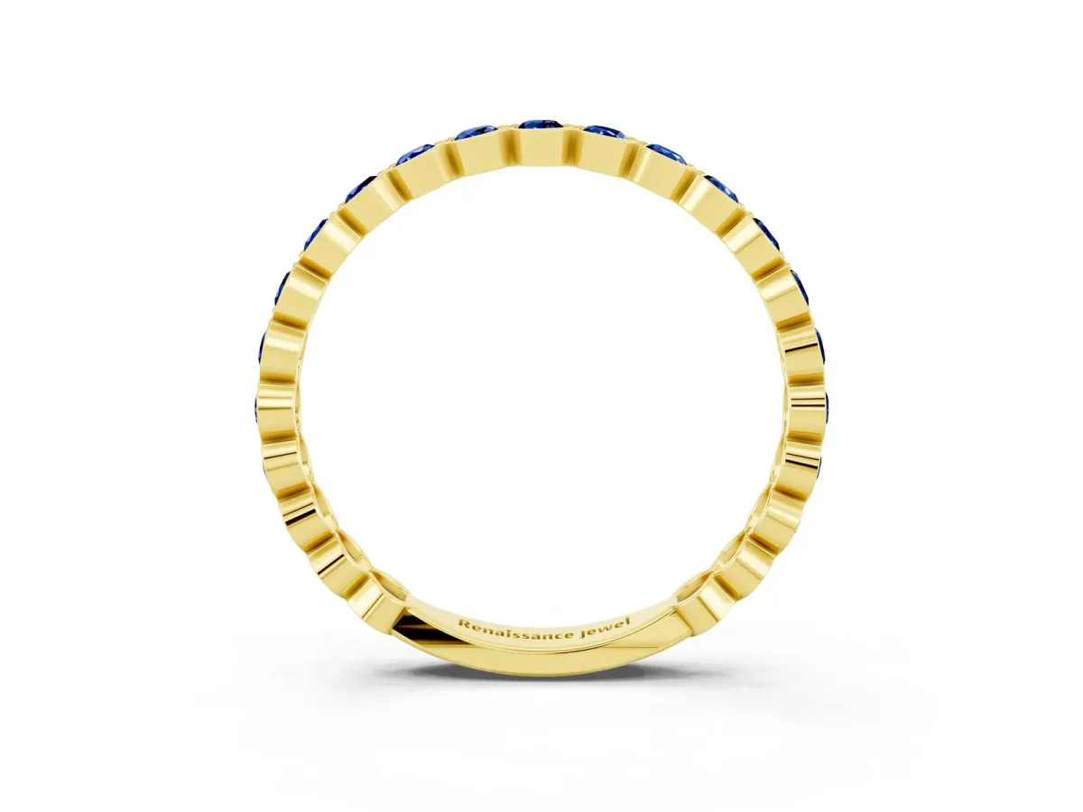 Round Blue Sapphire Bezel Set Eternity Band Yellow gold