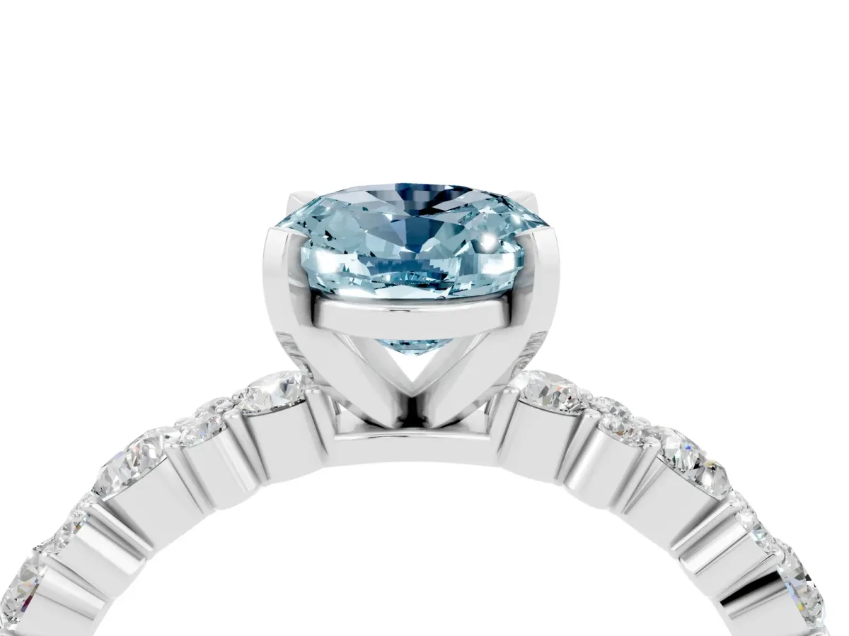Oval Cut Aquamarine Side Stone Solitaire Ring with Round and Four-Prong Setting White gold