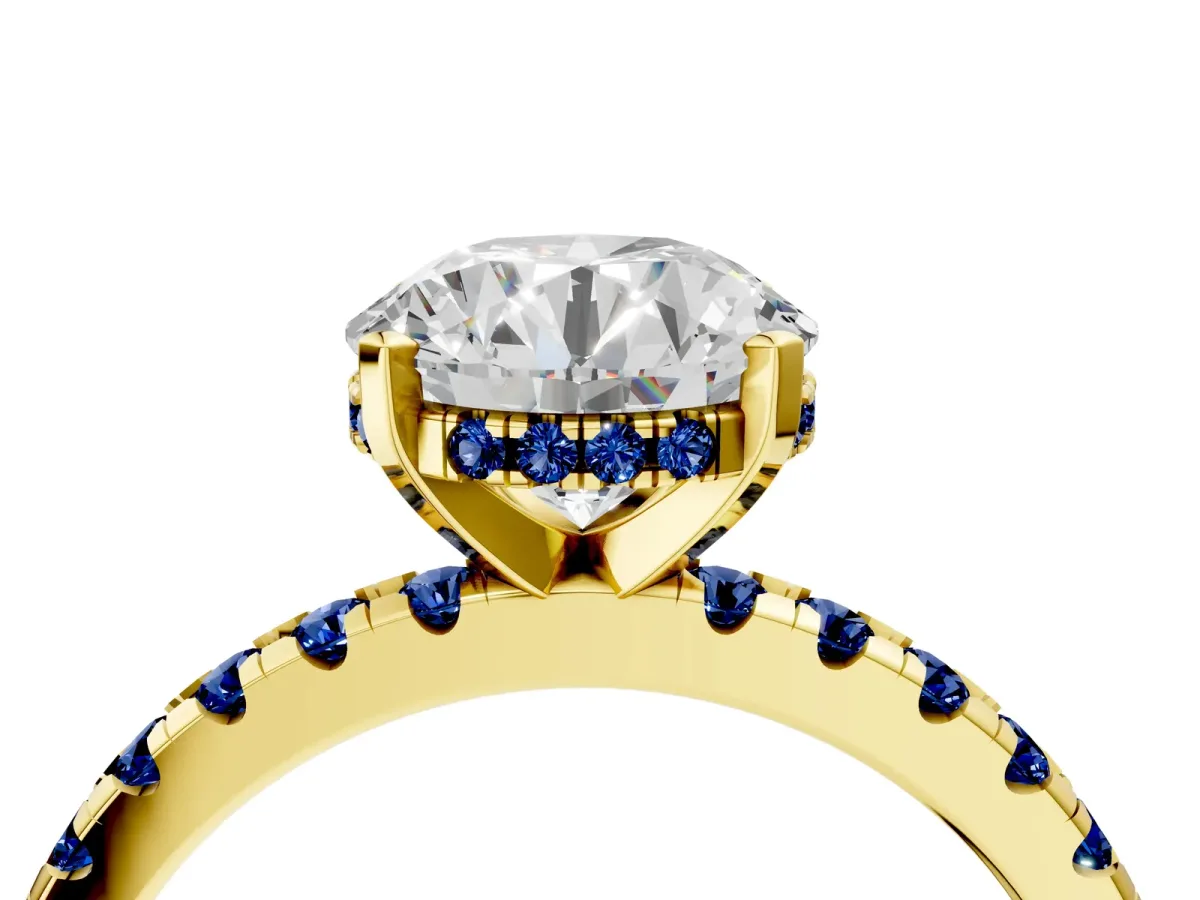 Round Cut Diamond Solitaire Ring with Round Blue Sapphire Pavé Band and Four-Prong Setting Yellow gold