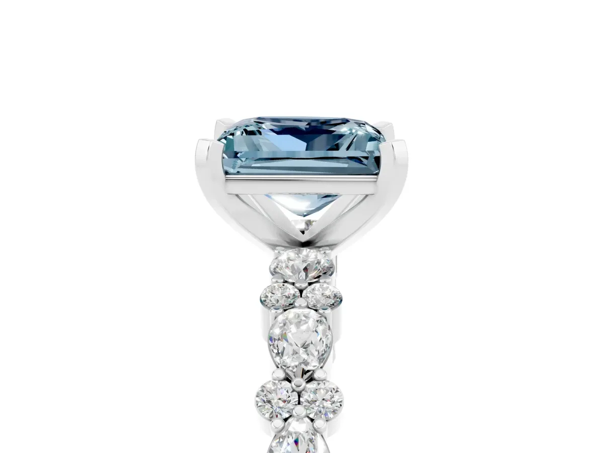 Princess Cut Aquamarine Side Stone Solitaire Ring with Round and Four-Prong Setting Silver