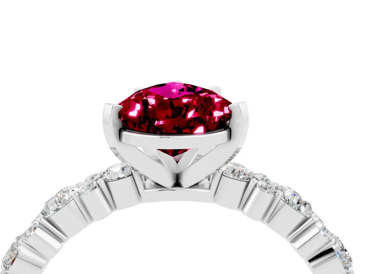 Pear Cut Garnet Side Stone Solitaire Ring with Round and Four-Prong Setting Silver