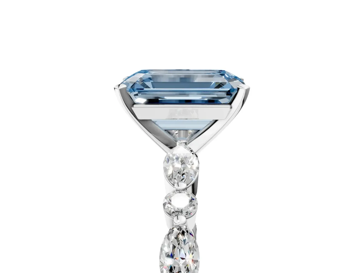 Fancy Blue Emerald Cut Diamond Ring with Marquise and Round Side Stones and Four-Prong Setting Silver