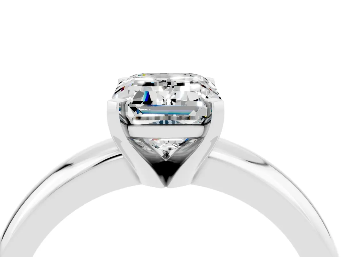 Emerald Cut Moissanite Solitaire Engagement Ring with Round Band and Four-Prong Setting Platinum