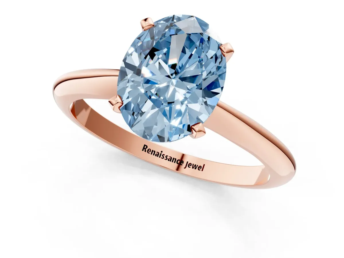 Fancy Blue Oval Cut Diamond Solitaire Engagement Ring with Classic Band and Four-Prong Setting Rose gold