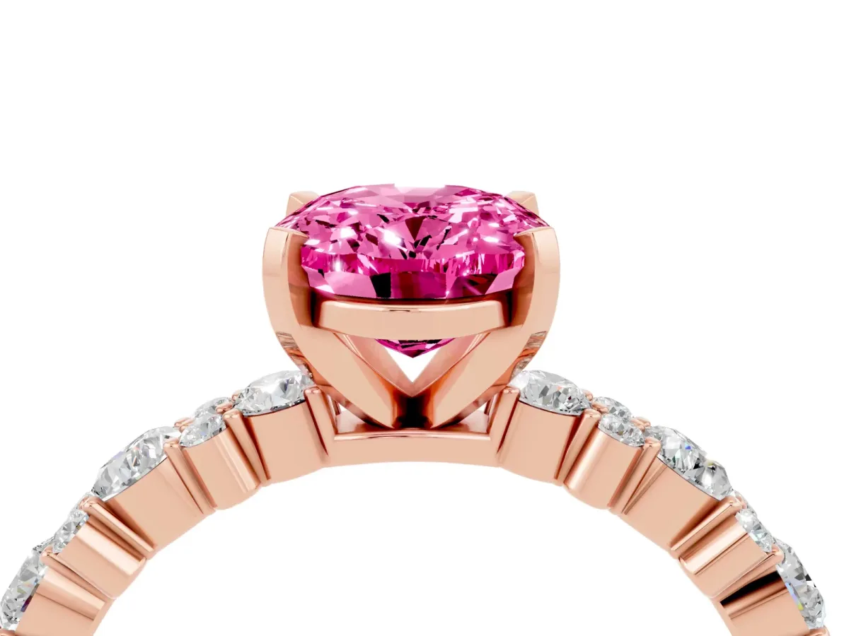 Oval Cut Pink Sapphire Side Stone Solitaire Ring with Round and Four-Prong Setting Rose gold