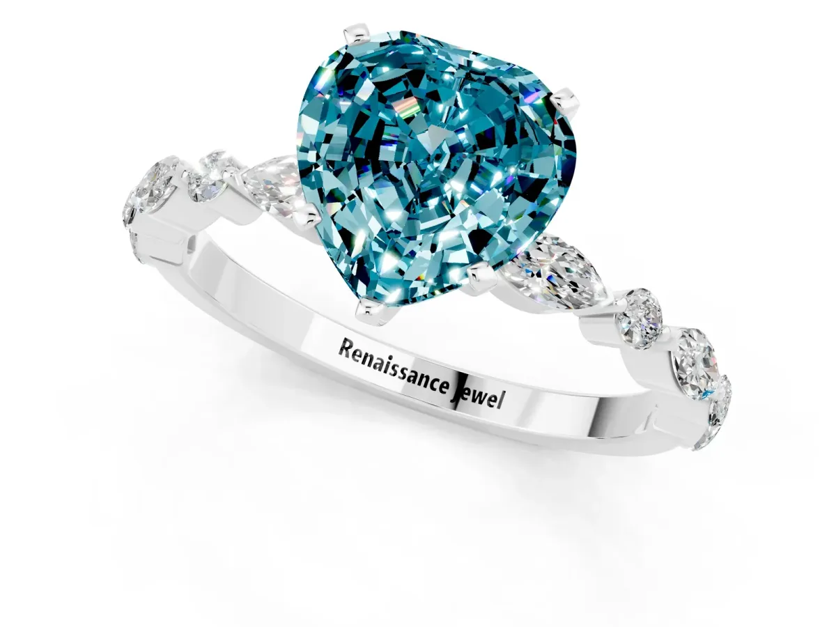 Heart Cut Blue Topaz Ring with Marquise and Round Side Stones and Four-Prong Setting Silver
