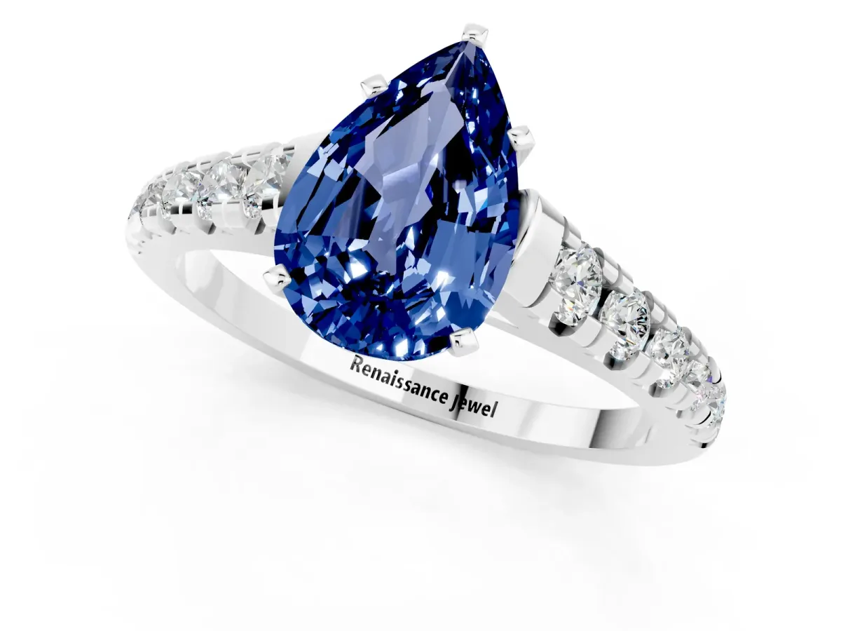 Pear Cut Blue Sapphire Cathedral Solitaire Ring with Round Pavé Band White gold